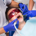 man-getting-dental-procedure_23-2148380323