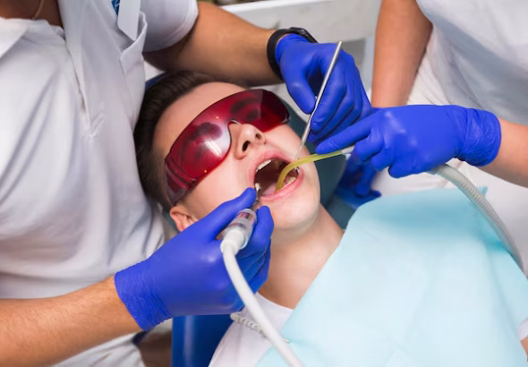man-getting-dental-procedure_23-2148380323